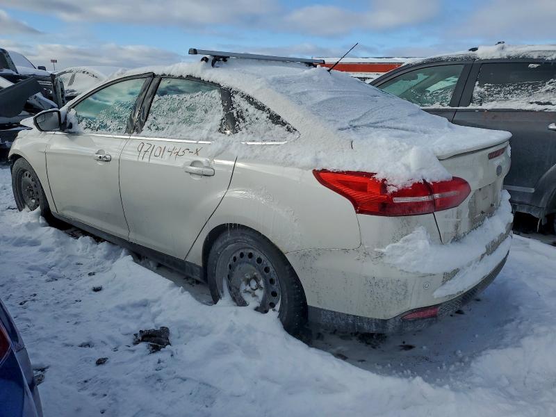 Photo 2 from auction – 2016 FORD FOCUS TITA with VIN 1FADP3J24GL303652
