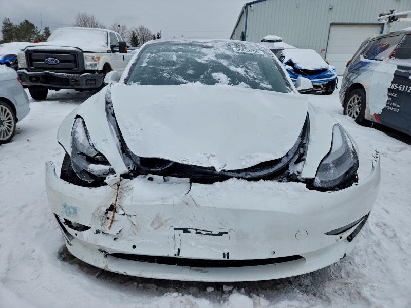 Photo 5 from auction – 2021 TESLA MODEL 3 with VIN 5YJ3E1EC7MF084591