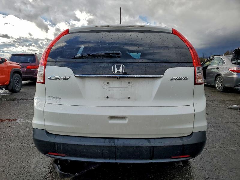 Photo 6 from auction – 2014 HONDA CR-V with VIN 5J6RM4H73EL119259