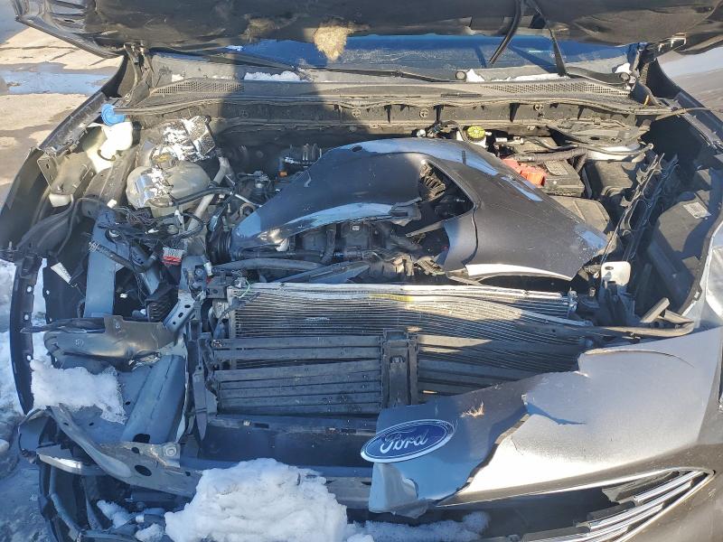 Photo 12 from auction – 2021 FORD ESCAPE TIT with VIN 1FMCU9J93MUB11736