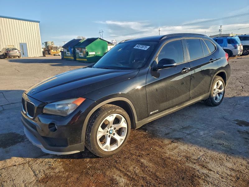 BMW X1 SDRIVE2 2015 with VIN WBAVM1C5XFV498885 - Photo from auction