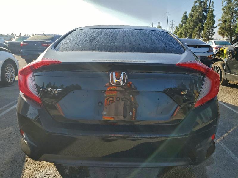 Photo 6 from auction – 2016 HONDA CIVIC LX with VIN 2HGFC2F58GH523242