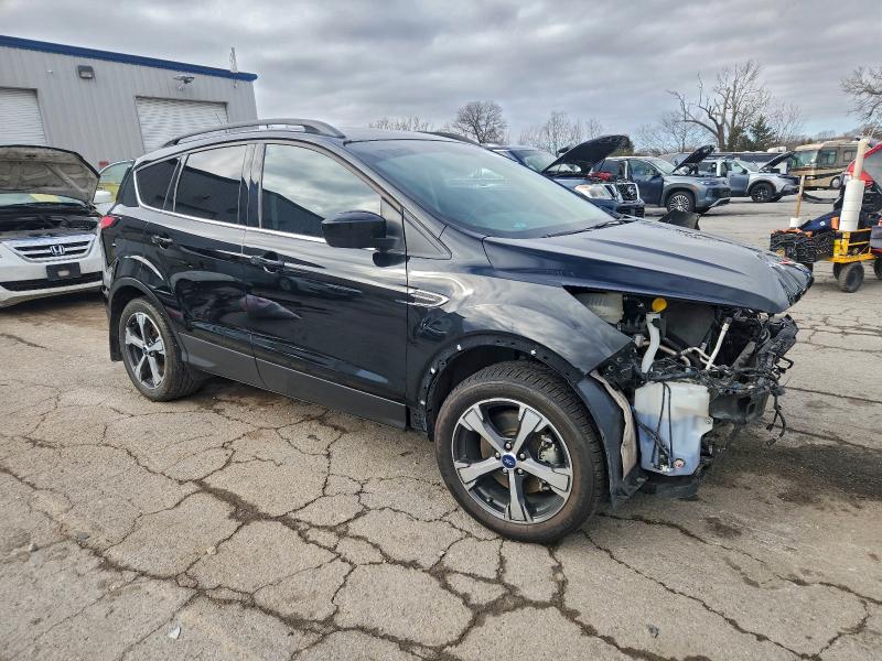 Photo 4 from auction – 2018 FORD ESCAPE SEL with VIN 1FMCU9HD6JUC07513