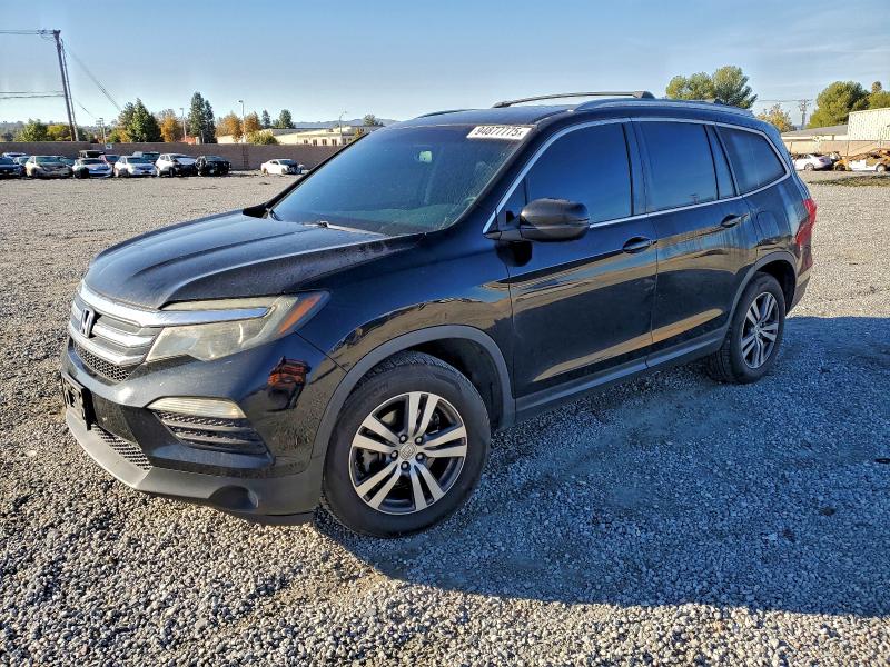HONDA PILOT EXL 2016 with VIN 5FNYF5H52GB028232 - Photo from auction
