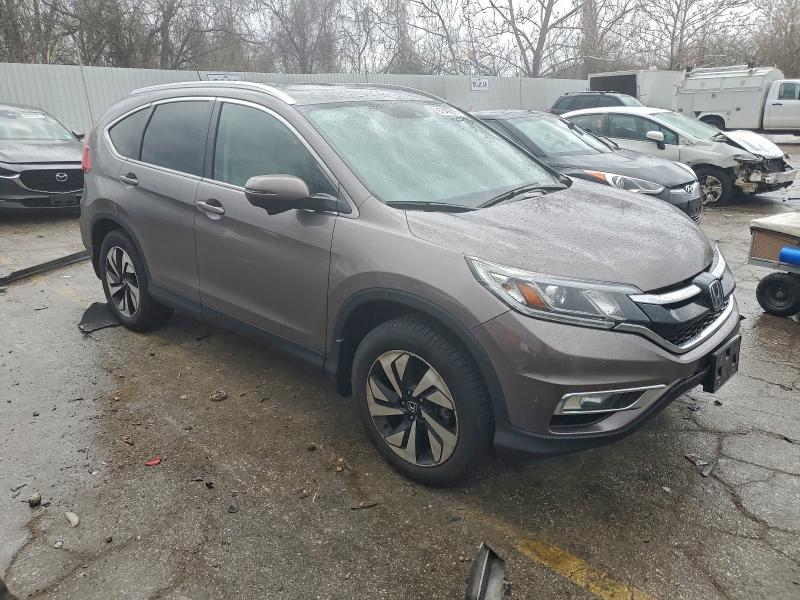 Photo 4 from auction – 2015 HONDA CRV with VIN 5J6RM4H9XFL059595