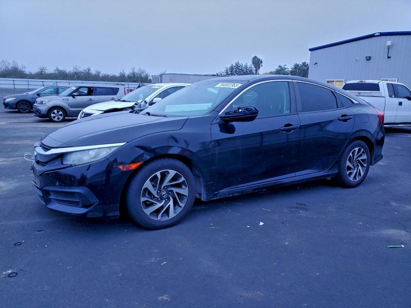 HONDA CIVIC EX 2017 with VIN 2HGFC2F74HH534287 - Photo from auction
