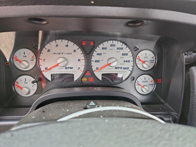 Photo 9 from auction – 2004 DODGE RAM SRT10 with VIN 3D3HA16H84G254390