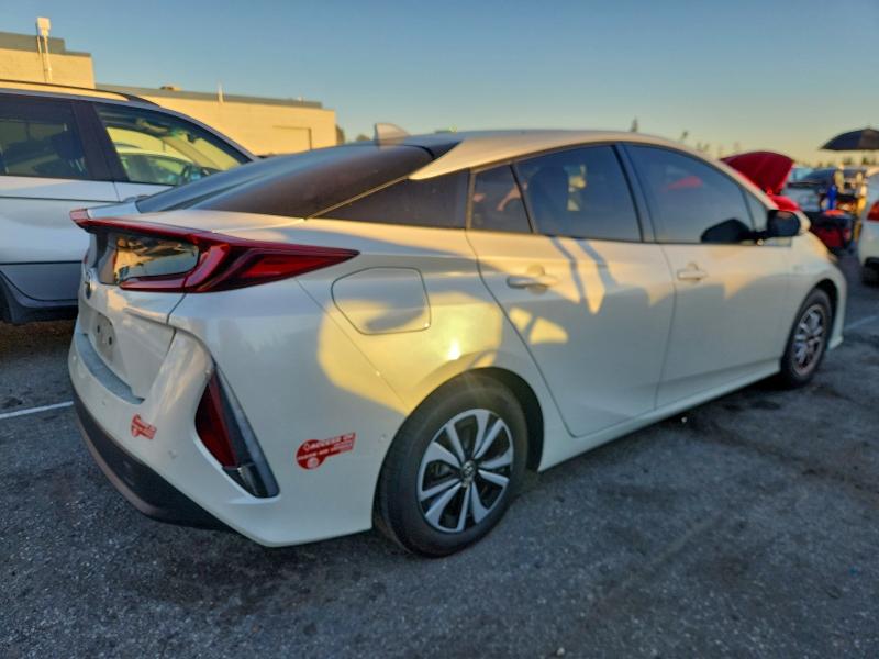 Photo 3 from auction – 2018 TOYOTA PRIUS PRIM with VIN JTDKARFP2J3094641