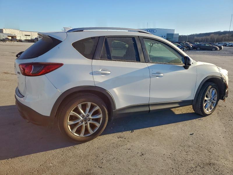 Photo 3 from auction – 2014 MAZDA CX-5 GT with VIN JM3KE2DY2E0314902