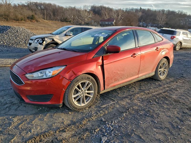 FORD FOCUS SE 2018 with VIN 1FADP3F23JL256582 - Photo from auction