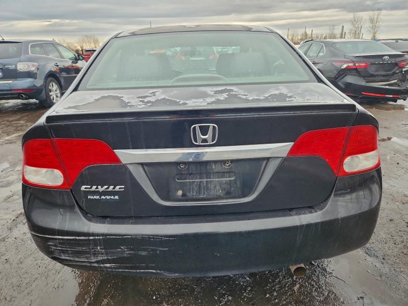Photo 6 from auction – 2011 HONDA CIVIC EXL with VIN 2HGFA1F00BH008829