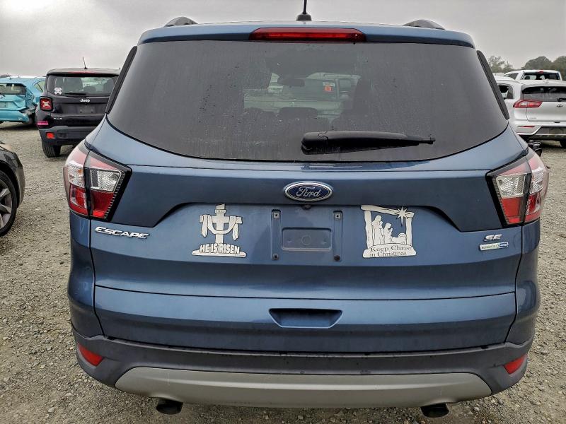 Photo 6 from auction – 2018 FORD ESCAPE SE with VIN 1FMCU9GD8JUC48940