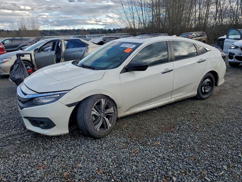 Photo 1 from auction – 2016 HONDA CIVIC TOUR with VIN 2HGFC1F93GH656794