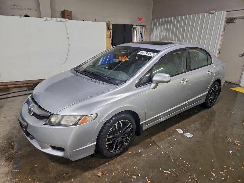 HONDA CIVIC EXL 2010 with VIN 19XFA1F93AE010498 - Photo from auction