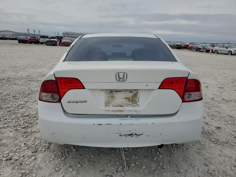 Photo 6 from auction – 2011 HONDA CIVIC LX with VIN 19XFA1F57BE019929
