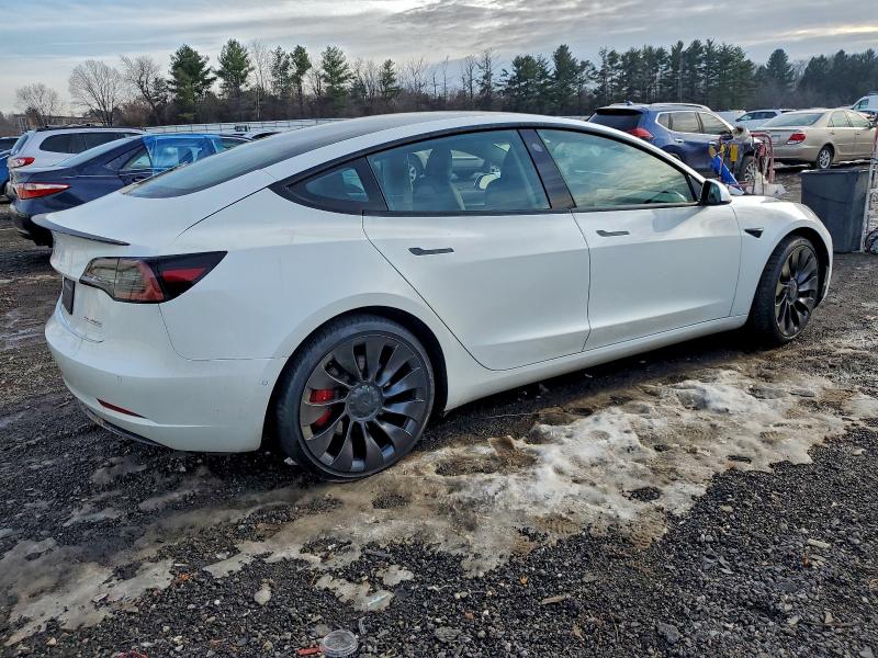 Photo 3 from auction – 2022 TESLA MODEL 3 with VIN 5YJ3E1EC1NF152112