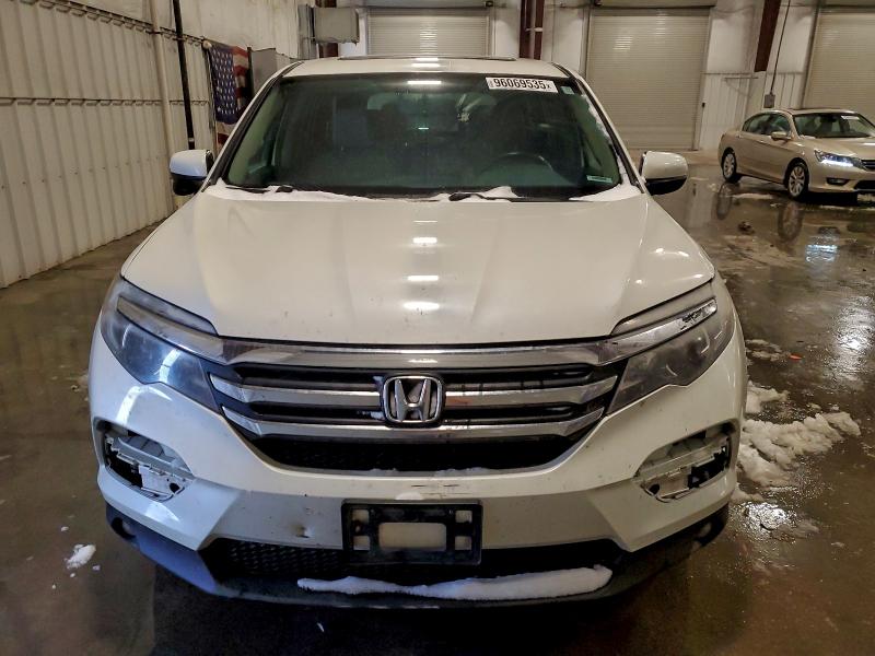 Photo 5 from auction – 2016 HONDA PILOT EXLN with VIN 5FNYF6H74GB124161