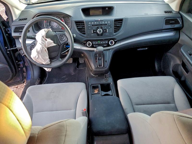 Photo 8 from auction – 2015 HONDA CR-V LX with VIN 2HKRM4H33FH693580
