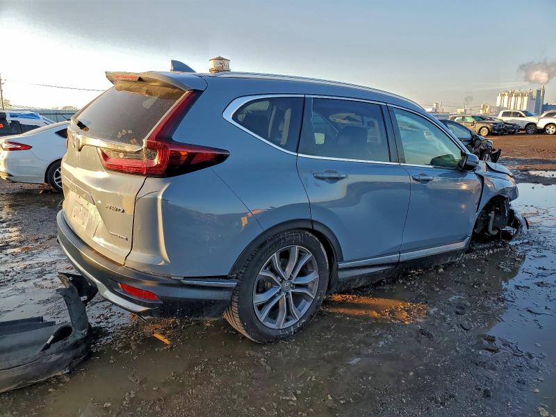 Photo 3 from auction – 2021 HONDA CR-V with VIN 5J6RW2H93ML001100