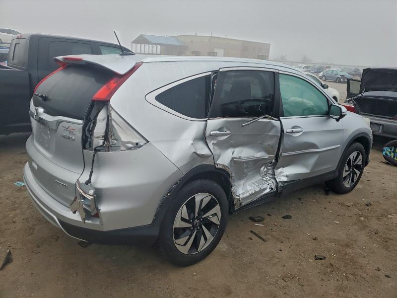 Photo 3 from auction – 2015 HONDA CR-V TOURI with VIN 5J6RM4H97FL093364