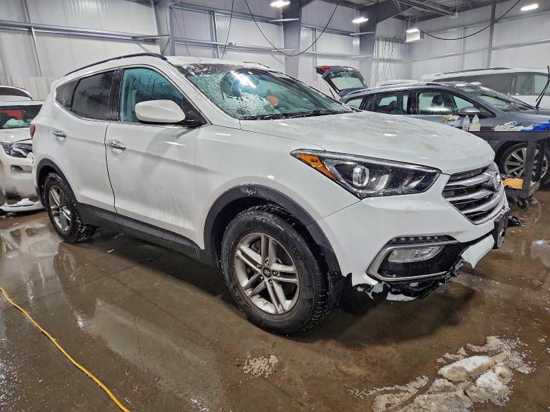 Photo 4 from auction – 2017 HYUNDAI SANTA FE S with VIN 5NMZU3LB5HH000341