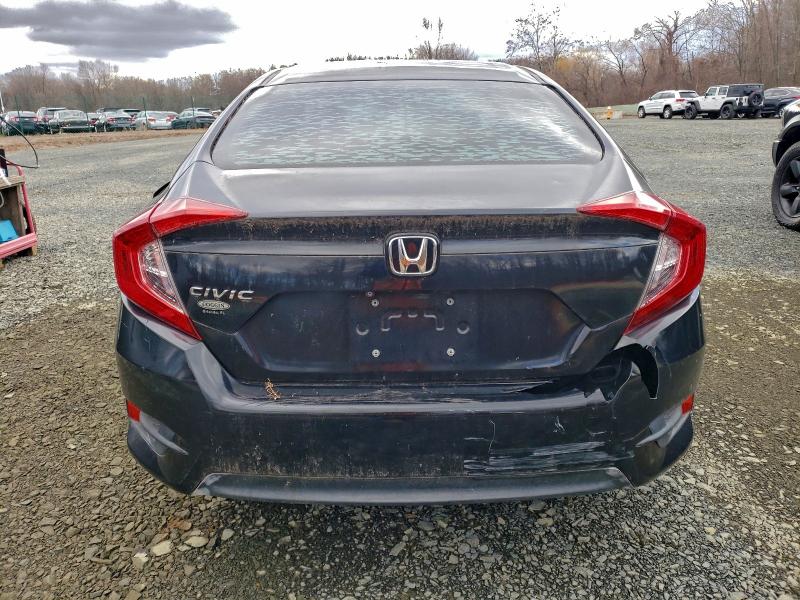 Photo 6 from auction – 2018 HONDA CIVIC LX with VIN 19XFC2F59JE003262