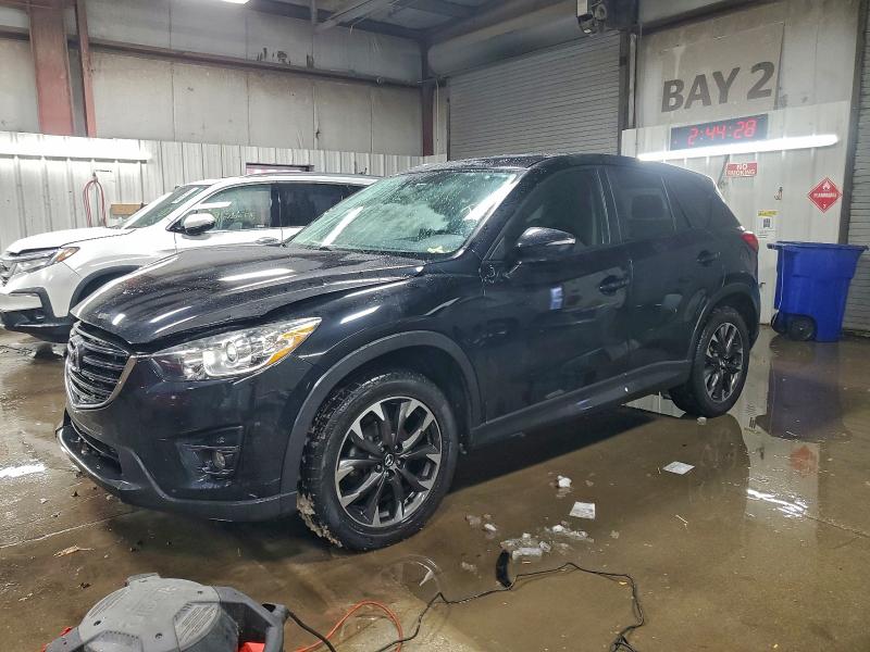 MAZDA CX-5 GT 2016 with VIN JM3KE2DY8G0797427 - Photo from auction