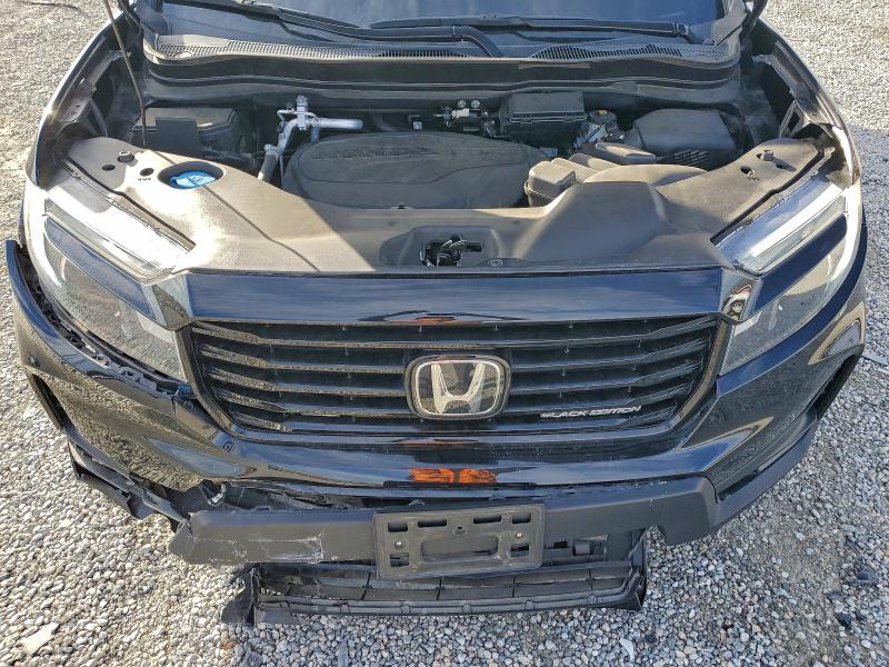Photo 11 from auction – 2023 HONDA RIDGELINE with VIN 5FPYK3F83PB058649