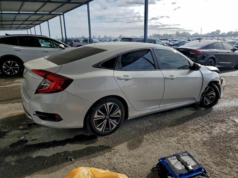 Photo 3 from auction – 2019 HONDA CIVIC LX with VIN 2HGFC2F67KH592196