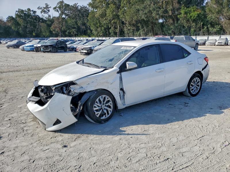 TOYOTA COROLLA L 2017 with VIN 5YFBURHE3HP730133 - Photo from auction