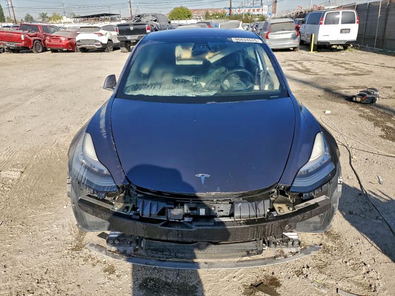 Photo 5 from auction – 2018 TESLA MODEL 3 with VIN 5YJ3E1EB9JF090928