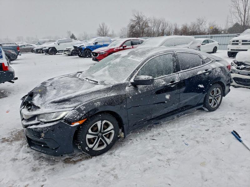 HONDA CIVIC LX 2017 with VIN 2HGFC2F50HH012352 - Photo from auction