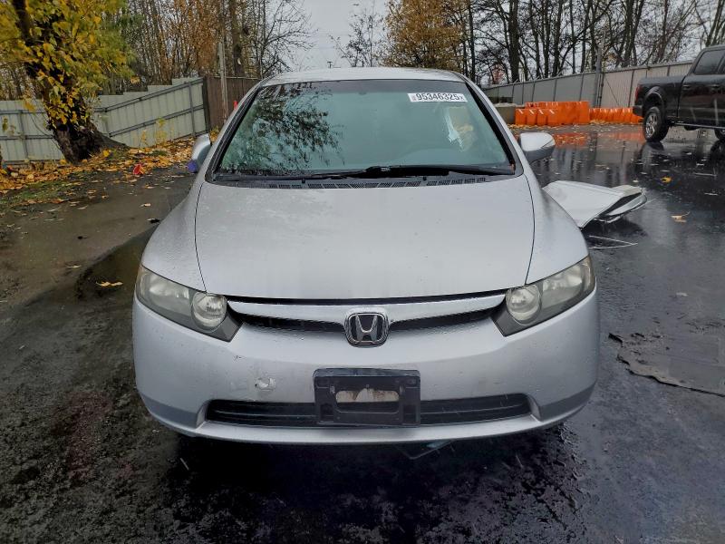 Photo 5 from auction – 2007 HONDA CIVIC HYBR with VIN JHMFA36297S006166