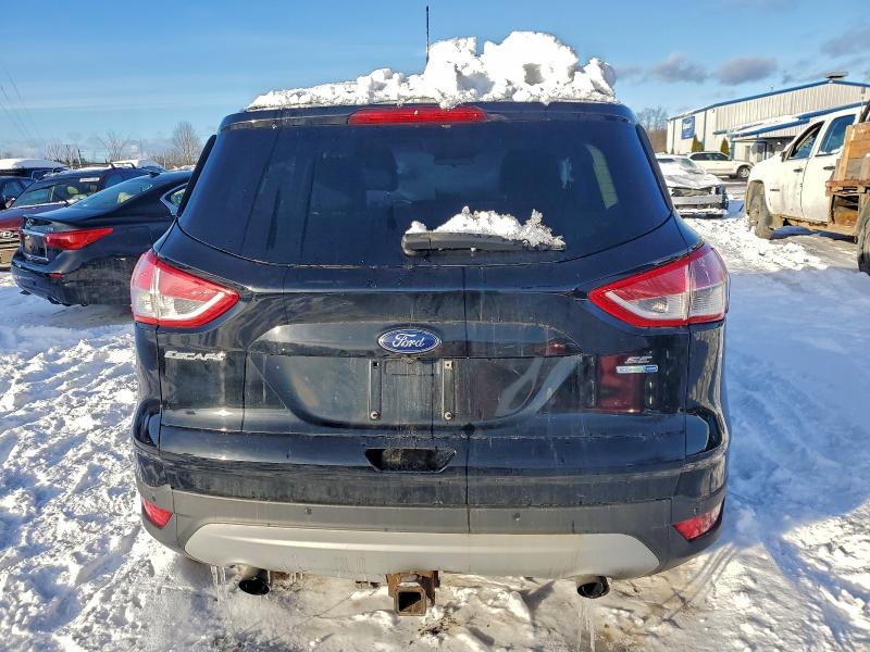 Photo 6 from auction – 2016 FORD ESCAPE SE with VIN 1FMCU9G91GUB10130