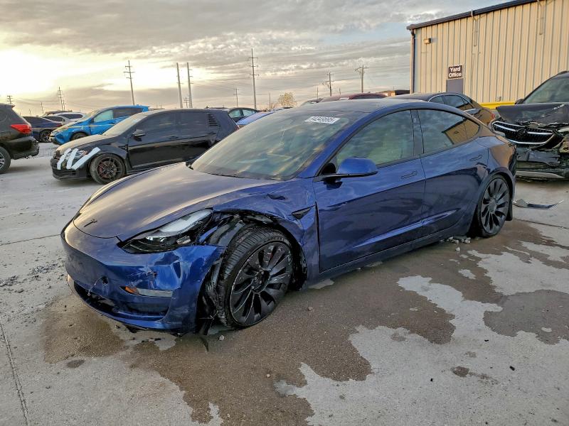 TESLA MODEL 3 2022 with VIN 5YJ3E1EC4NF328585 - Photo from auction