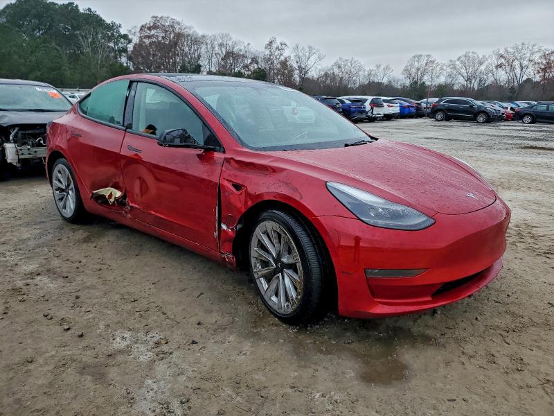 Photo 4 from auction – 2022 TESLA MODEL 3 with VIN 5YJ3E1EAXNF372587