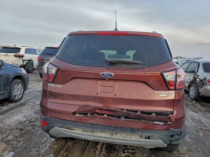 Photo 6 from auction – 2018 FORD ESCAPE TIT with VIN 1FMCU9J96JUC89779