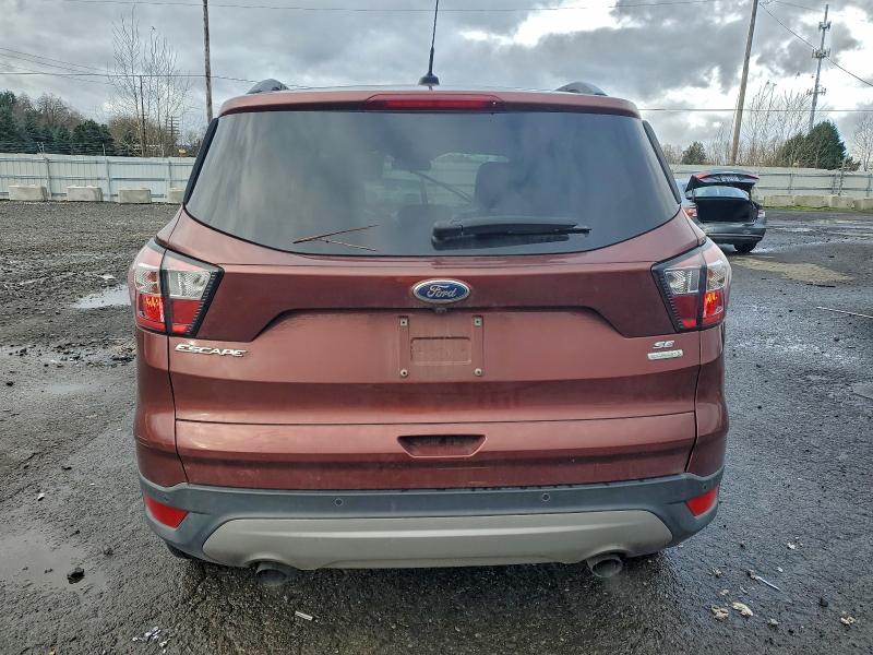 Photo 6 from auction – 2018 FORD ESCAPE SE with VIN 1FMCU0GD6JUB46810
