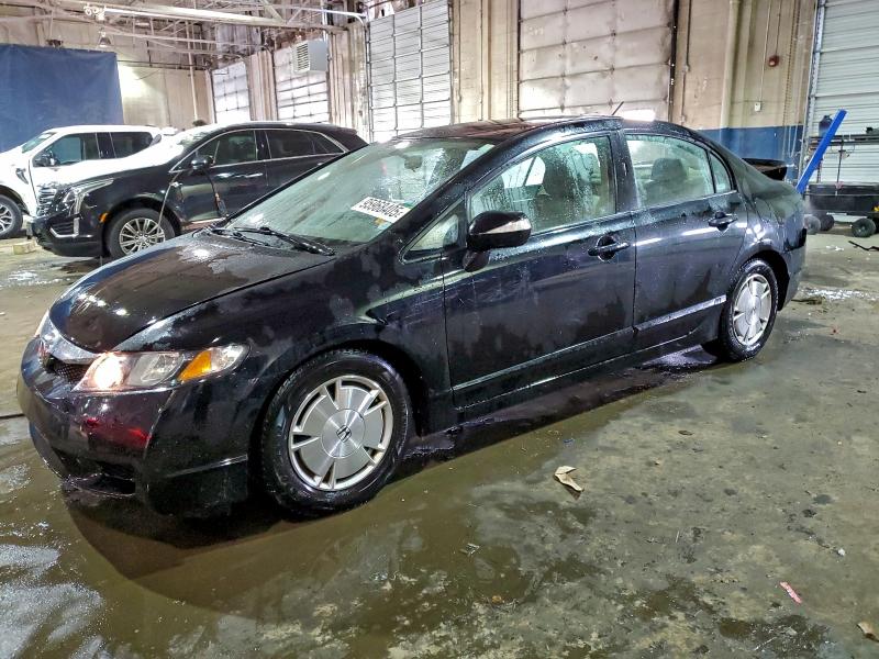 HONDA CIVIC HYBR 2010 with VIN JHMFA3F26AS004818 - Photo from auction