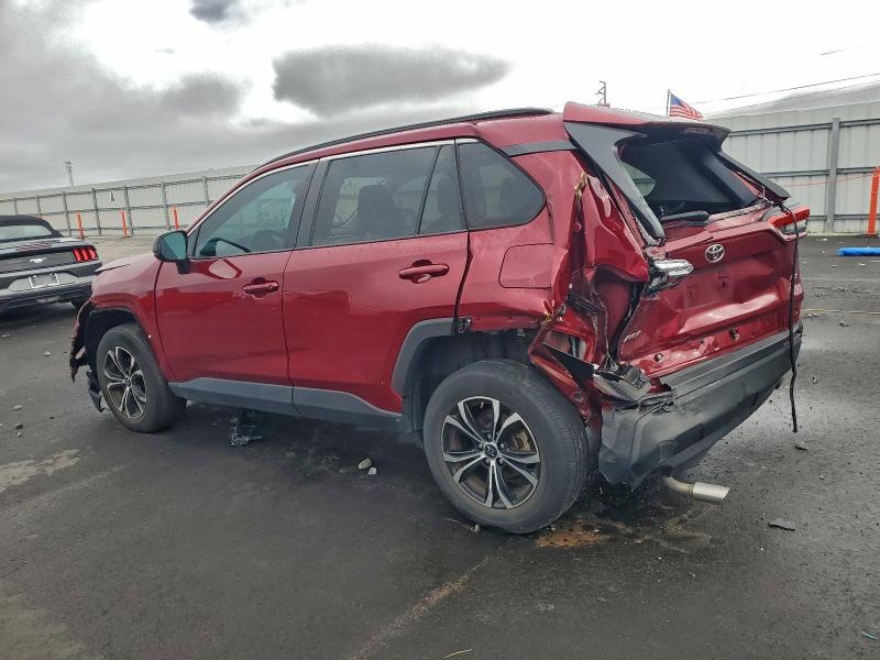 Photo 2 from auction – 2021 TOYOTA RAV4 LE with VIN 2T3H1RFVXMW136953