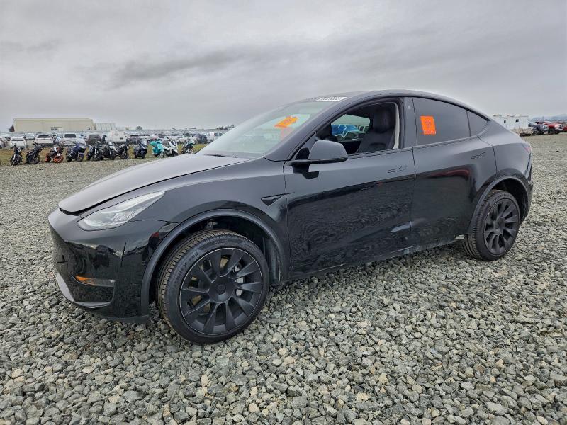 TESLA MODEL Y 2022 with VIN 7SAYGAEEXNF433765 - Photo from auction