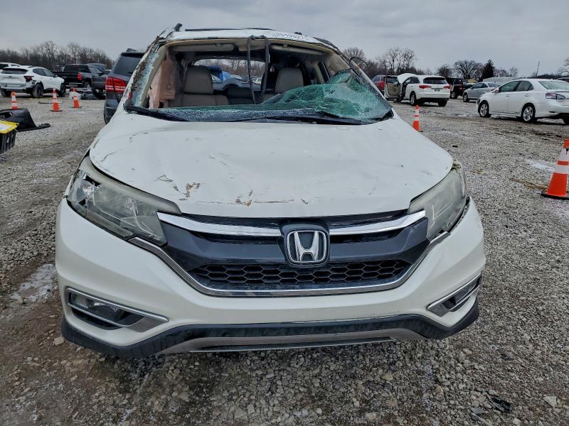Photo 5 from auction – 2016 HONDA CR-V EXL with VIN 5J6RM4H76GL015058