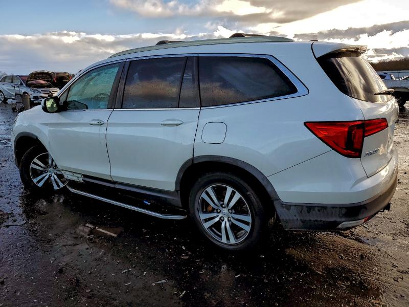 Photo 2 from auction – 2018 HONDA PILOT with VIN 5FNYF6H51JB025612