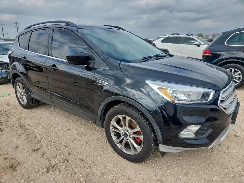Photo 4 from auction – 2018 FORD ESCAPE with VIN 1FMCU9GD3JUC49414