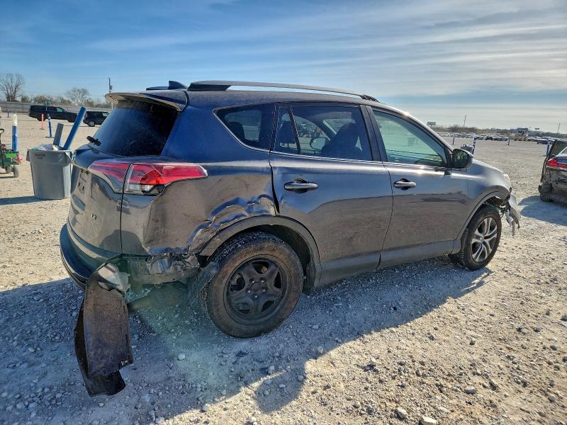 Photo 3 from auction – 2017 TOYOTA RAV4 LE with VIN JTMZFREV4HJ129086