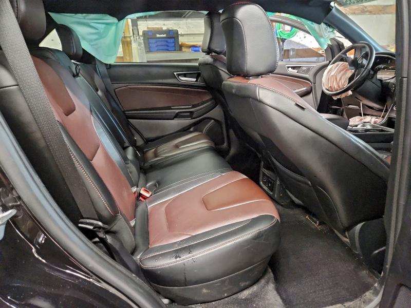 Photo 11 from auction – 2021 FORD EDGE TITAN with VIN 2FMPK4K98MBA41116
