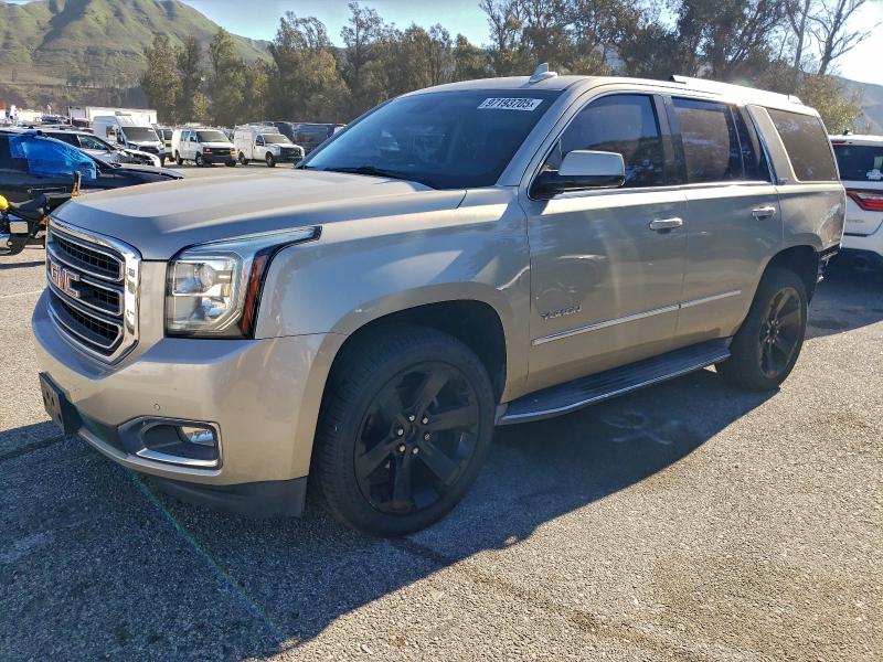 GMC YUKON SLT 2016 with VIN 1GKS1BKC0GR212495 - Photo from auction