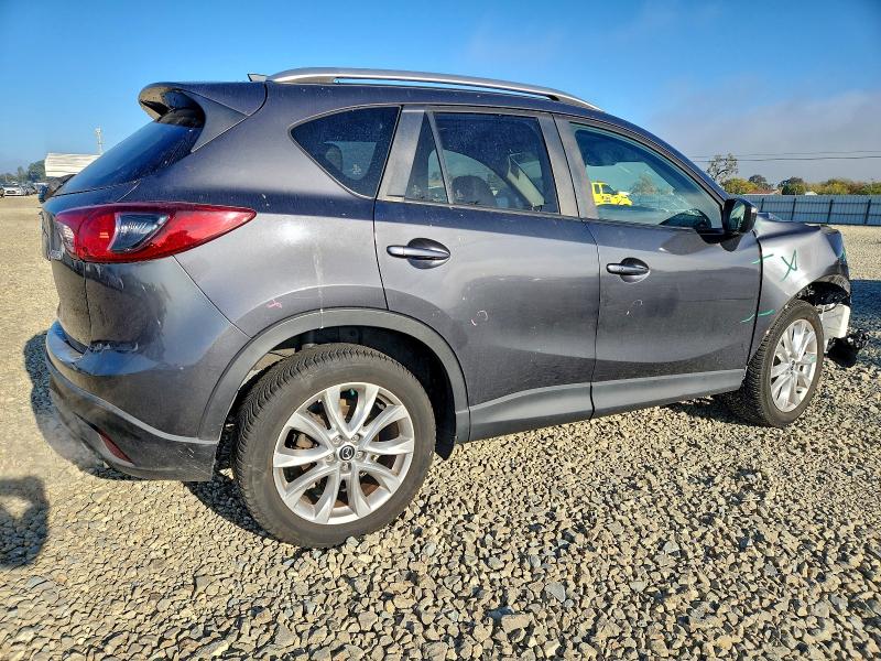 Photo 3 from auction – 2015 MAZDA CX-5 GT with VIN JM3KE4DY1F0477912