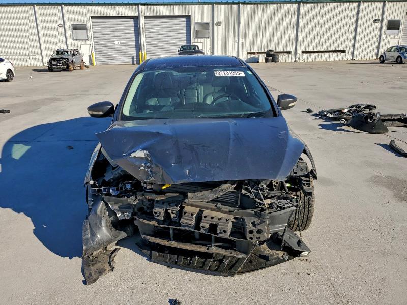 Photo 5 from auction – 2016 FORD FOCUS SE with VIN 1FADP3F29GL318124