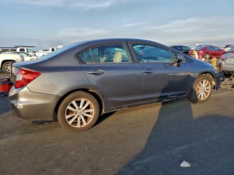 Foto 3 de la subasta – 2012 HONDA CIVIC EXL con VIN 2HGFB2F91CH550640